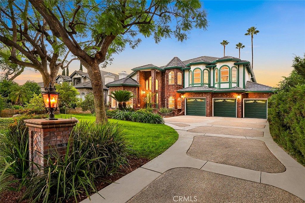 Formal living room with fireplace and cathedral ceiling