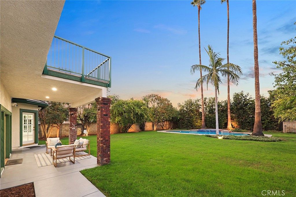 Family room with floor-to-ceiling marble fireplace