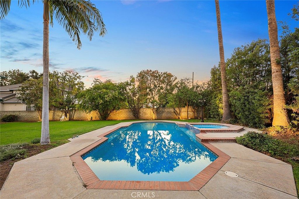 Home library with custom hardwood cabinetry