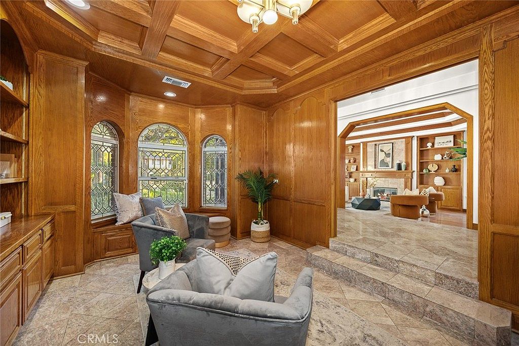 Three-car attached garage with custom doors