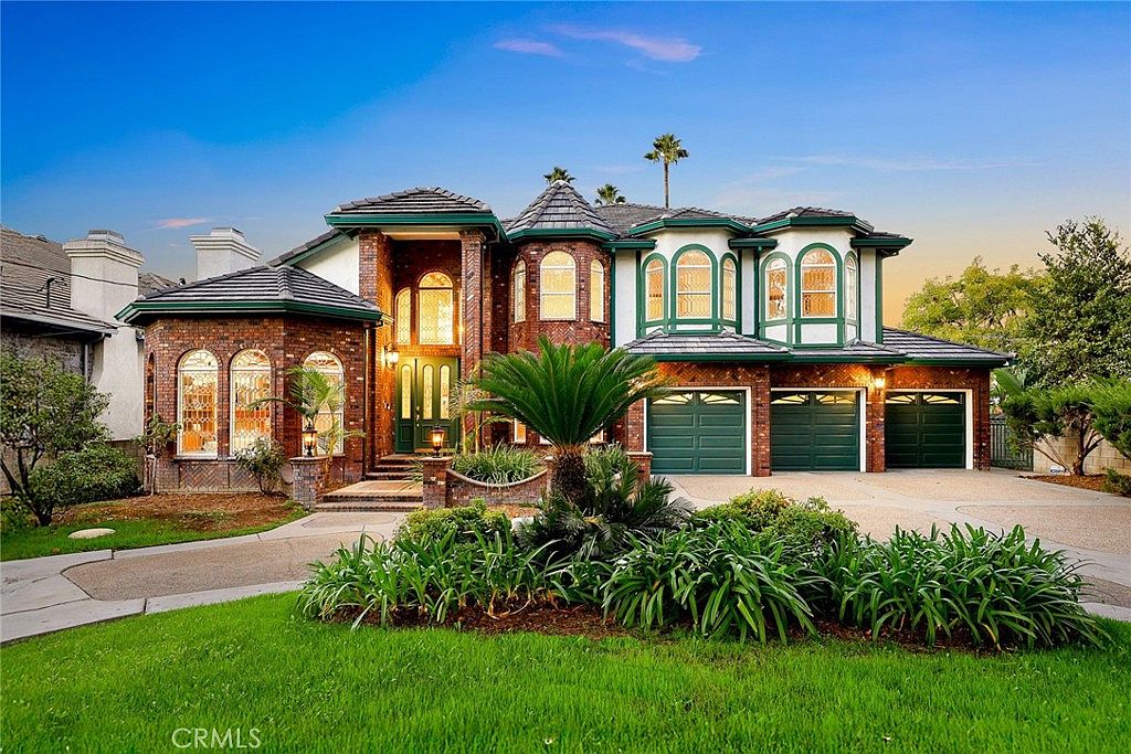 Front exterior of 151 E Longden Ave, a French Normandy estate in Arcadia